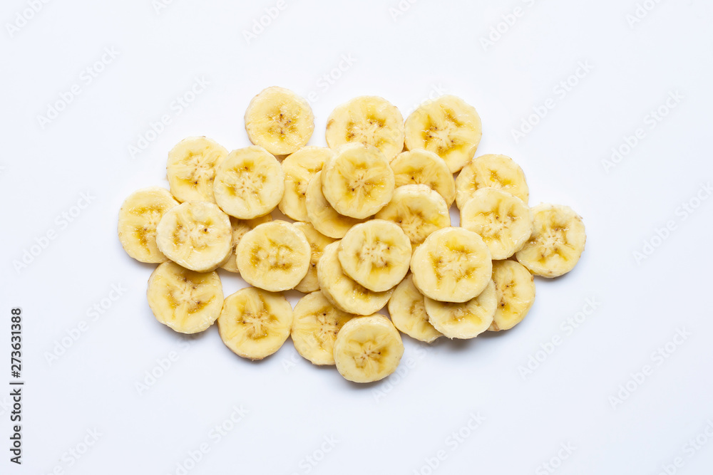 Wall mural banana slices on white background.