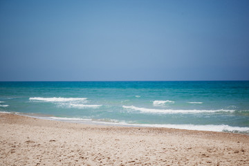 Fototapeta na wymiar Mediterranean beach with turquoise water in sunny weather