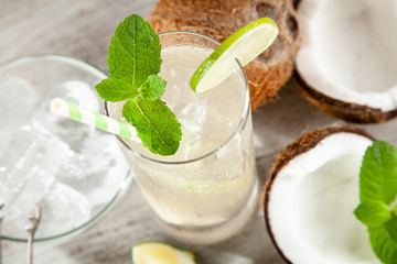 Coconut water drink on wooden background