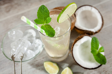 Coconut water drink on wooden background