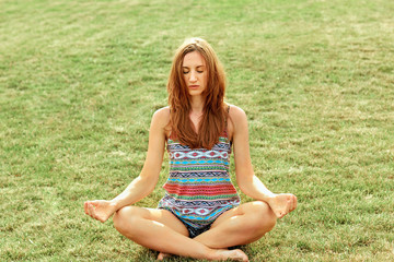 Young woman is practicing yoga