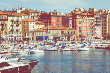 Fototapeta na wymiar Old port of Nice. Yachts and fishing boats moored in the harbor of Nice, Cote d'Azur, France.