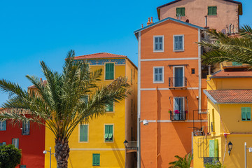 Colorful houses in old town architecture of Menton on French Riviera. Provence-Alpes-Cote d'Azur,...