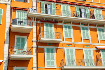 Colorful houses in old town architecture of Menton on French Riviera. Provence-Alpes-Cote d'Azur, France.