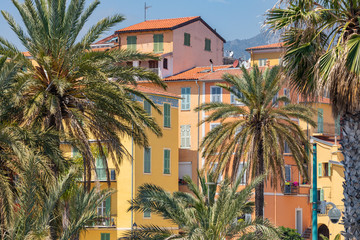 Fototapeta na wymiar Colorful houses in old town architecture of Menton on French Riviera. Provence-Alpes-Cote d'Azur, France.