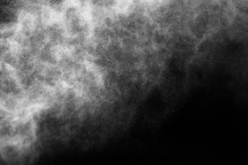A stream of water and a cloud of drops