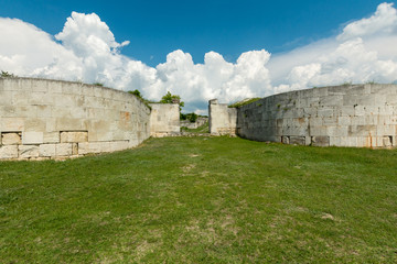 Adamclisi, Romania - June 10 2019: ruins of ancient roman fortification near Adamclisi town, Constanta county