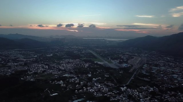 Dark Panoramic Aerial View Of Hong Kong Rural Villages At Sunset. Hong Kong China Border. Kam Tin. Shek Kong Airfield. MTR Maintenance Centre. New Territories. Shenzhen. 4K.