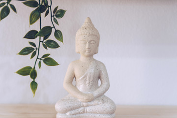 White Buddha isolated in white background