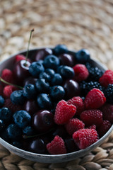 fresh berries in a clay bowl