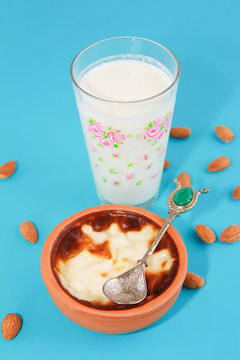 traditional Turkish sweet supangle dish, a glass of airan and almonds