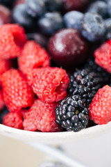 raspberries and blackberries in bowl