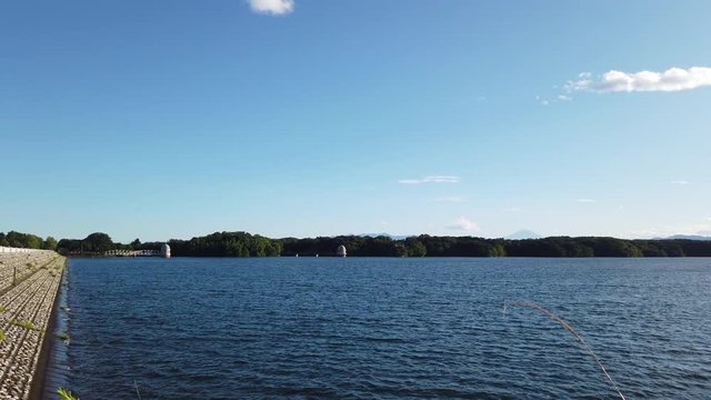 Quiet Sayama Reservoir in early summer evening