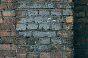 old red brick wall background painted in gray 