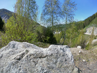 Mountain rocks with against sky and trees
