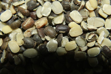 Indian splitted white lentil,Vigna mungo, black gram, urad bean, urid bean, minapa pappu, mungo bean or black matpe bean, food background.