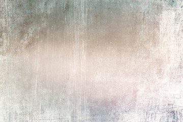 Old pastel colored grungy wall background or texture