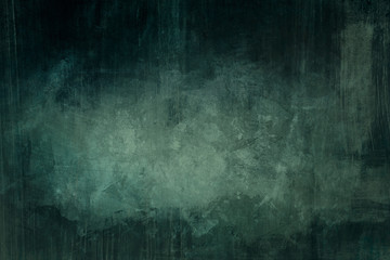 Obraz na płótnie Canvas Dark green grungy background with spotlight background