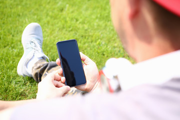 Modern hand hold smartphone park great