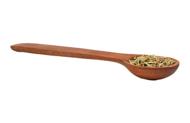 Dry rosemary in a spoon