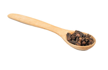 Dry cloves in spoon