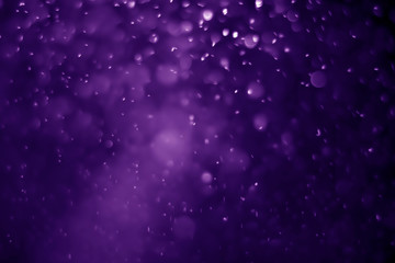 Fototapeta premium Bokeh purple proton background abstract