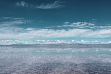 Endless landscapes with reflection like mirror of sky in Salar de Uyuni, Bolivia