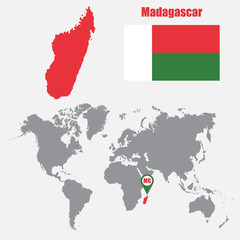 Madagascar map on a world map with flag and map pointer. Vector illustration