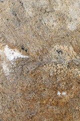 Close up of concrete surface after water damage. Vertical image.
