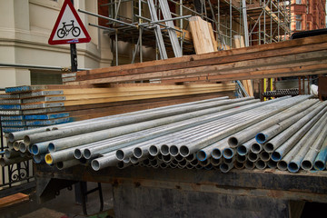 Professional scaffolding rods on the back of a work lorry.