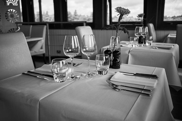 A table set for two in an elegant restaurant.