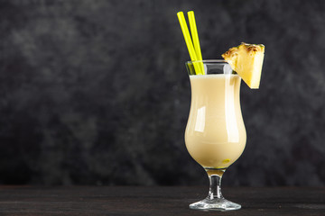 Pina Colada Cocktail on dark background