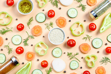 Salad ingredients layout. Food pattern with cherry tomatoes, cucumbers, greens, pepper and spices