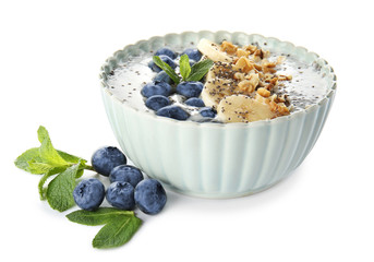 Bowl with tasty chia dessert on white background