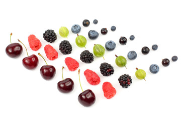 many different juicy berries are arranged in order on a white background