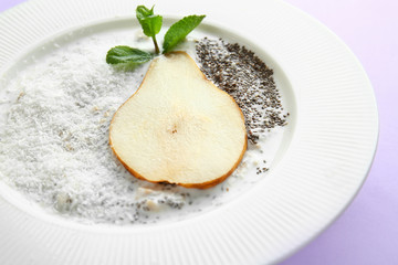 Bowl with tasty chia dessert on color background, closeup