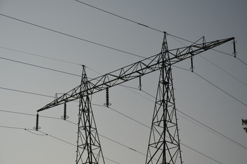 electricity pylons at sunset