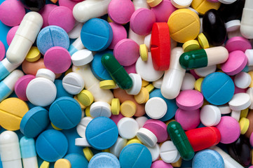 Top view - colorful medical pills and drugs.