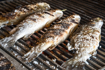 Grilled salt fish on the grill.