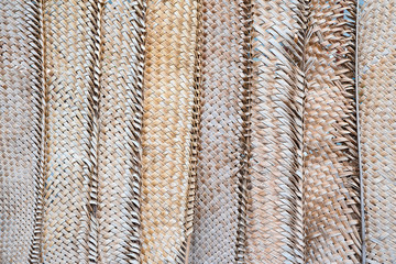 Pattern weaving of coconut leaves for background.