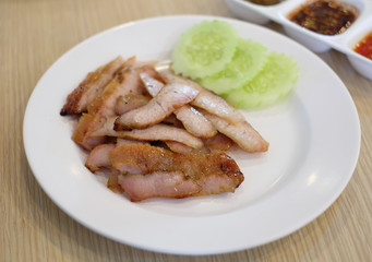 roasted neck pork on white dish