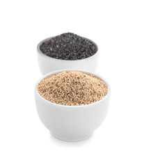 Bowls with different poppy seeds on white background