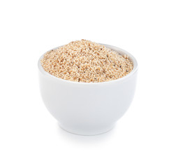 Bowl with poppy seeds on white background
