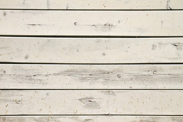 Old white wooden planks wall