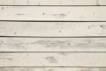 Naklejka premium Old white wooden planks wall