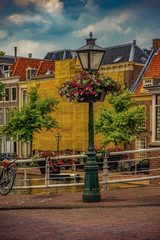 Leiden, Netherlands:Lamppost and tradional Dutch houses in canal water