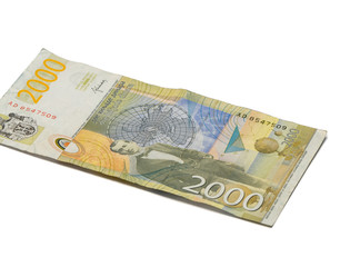 One  banknote worth 2000 Serbian Dinars with a portrait of a climate scientist Milutin Milankovic isolated on a white background