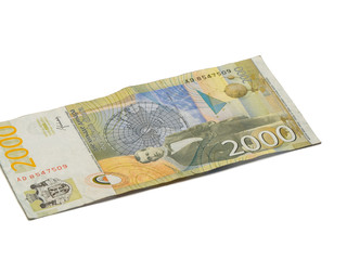 One  banknote worth 2000 Serbian Dinars with a portrait of a climate scientist Milutin Milankovic isolated on a white background