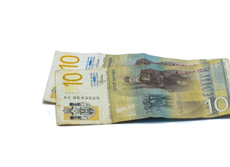 Two  banknotes worth 10 Serbian Dinars with a portrait of a Linguist Vuk Karadzic isolated on a white background