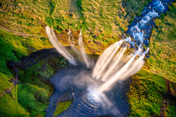 Dramatic top view of waterfall peak, Iceland